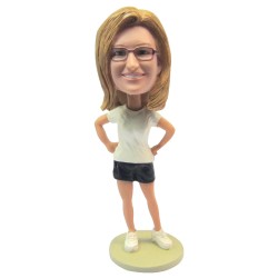 Female In T-Shirt And Shorts With Hands In Hips