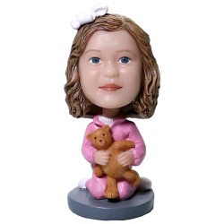 Little Girl With A Teddy Bear