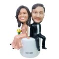 Custom Interestingly sitting wedding cake toppers bobbleheads