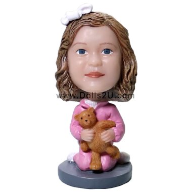 kid with a stuffed bear