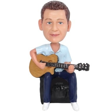 (image for) Custom Bobblehead Guitar Player Sitting On Sofa