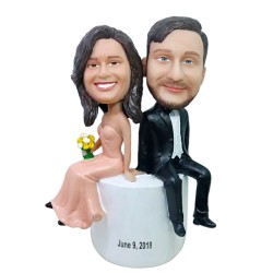 Custom Interestingly sitting wedding cake toppers bobbleheads
