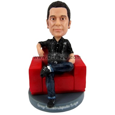 Casual Male Sitting On Sofa