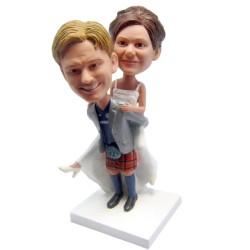 (image for) custom wedding bobbleheads groom kilt carrying bride