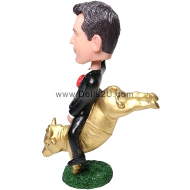  Male Riding Golden Bull Bobblehead