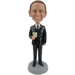 Male Executive In Black Suit Holding Money
