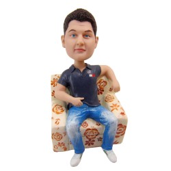 Casual Male Sitting On Sofa
