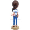 Casual Female In T-shirt And Blue Jeans