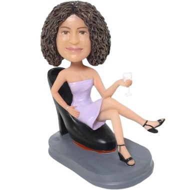 (image for) Custom Female Bobblehead Sitting On Black High Heel Shoe