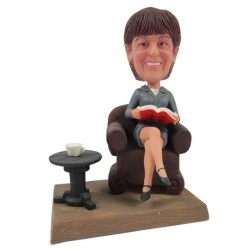 Custom Bobblehead Business Woman Sitting On A Couch Reading A Book