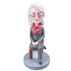 female sitting on the chair