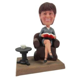 Custom Bobblehead Business Woman Sitting On A Couch Reading A Book