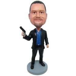 male holding a gun