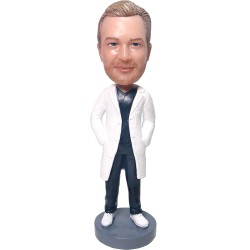 Male Doctor Wearing Blue Scrubs With A White Doctor Lab Coat
