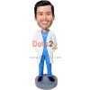 Male Doctor Wearing Blue Scrubs With A White Doctor Lab Coat